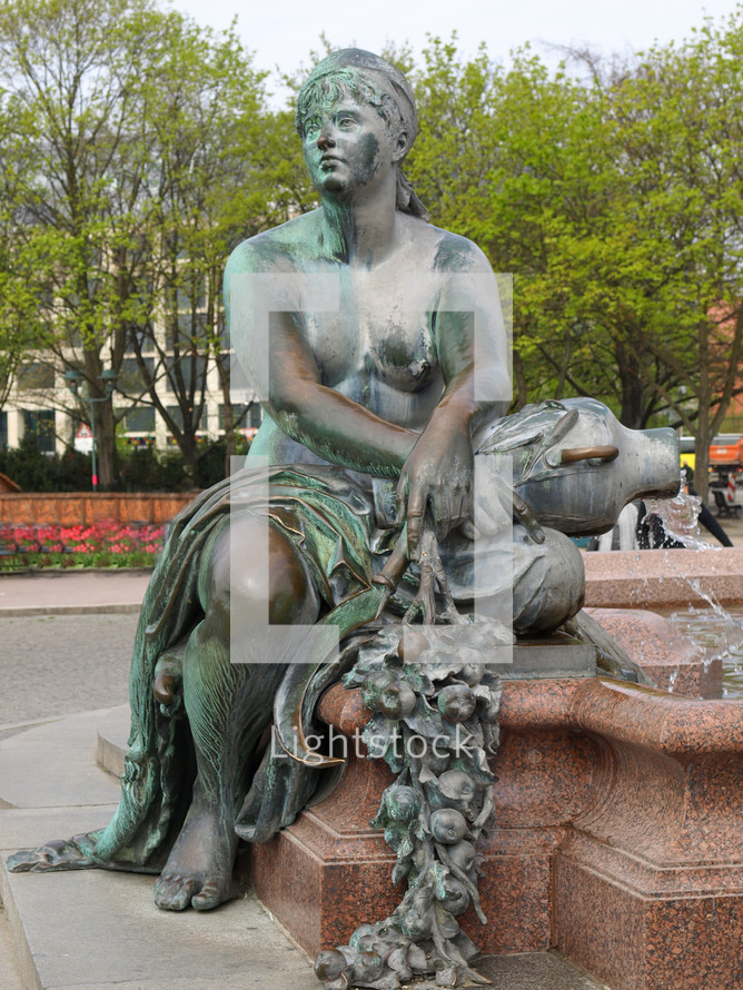 Neptunbrunnen Neptune fountain in Alexanderplatz square, Berlin, Germany