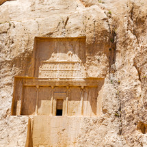 Ruins carved into a mountainside in Iran