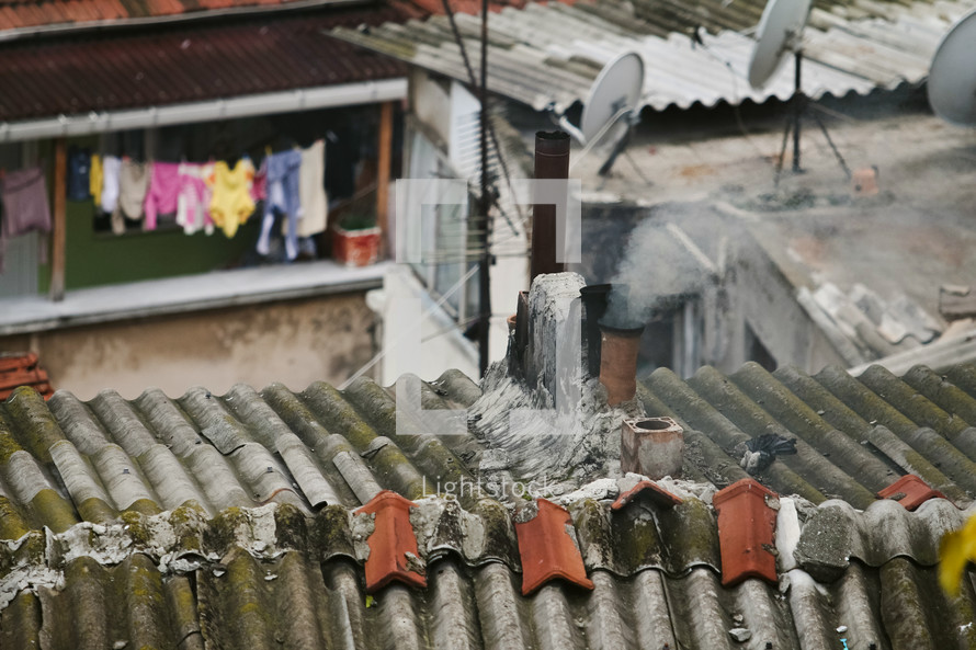 metal shingles on a roof and clothes on a clotheslines in Turkey 