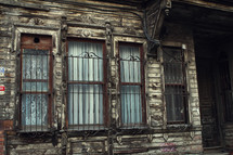 bars on windows on a wooden house in Turkey 