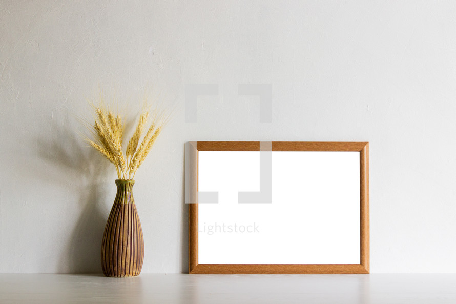 wheat grains and blank frame 