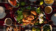 Vertical Of Roasted Turkey And Table Full Of Food For Thanksgiving Day