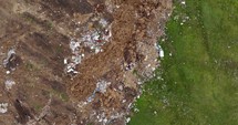 Aerial top down shot of Trash And Garbage On a Field.