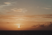 orange sky at sunset over the ocean 