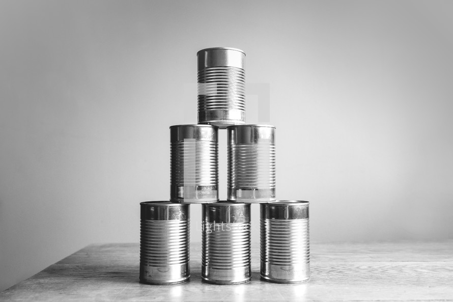 stack of plain tin canned food
