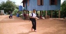 Young Student Leaving School In Southeast Asia