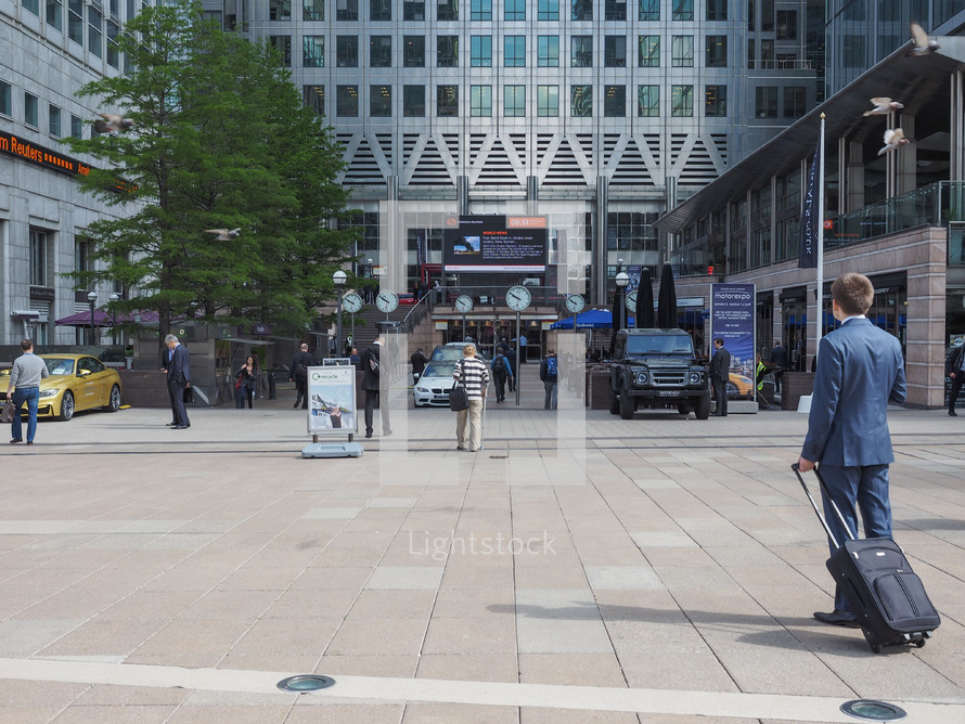LONDON, UK - JUNE 10, 2015: Workers at the Canary Wharf business centre which is the largest business district in the United Kingdom
