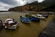 boats docked along an Italian coastline 