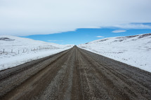  Gravel road and winter landscape