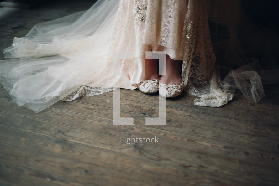 shoes under a wedding gown 