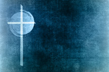 light cross and swirl circle with stencil effect on a distressed blue background, off-center with copy space