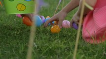 children gathering eggs at an Easter egg hunt 