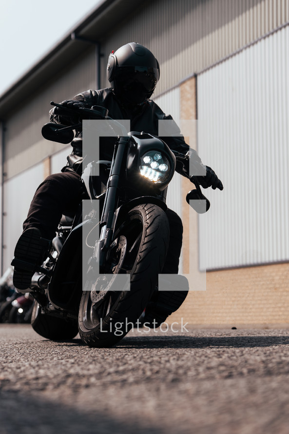 Black motorcycle cool motorbike rider, urban freedom biker