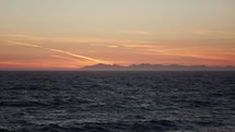 Sailing in Alaska at sunset