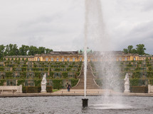 POTSDAM, GERMANY - MAY 10, 2014: Tourists visiting the baroque Schloss Sanssouci former summer palace of Frederick the Great King of Prussia