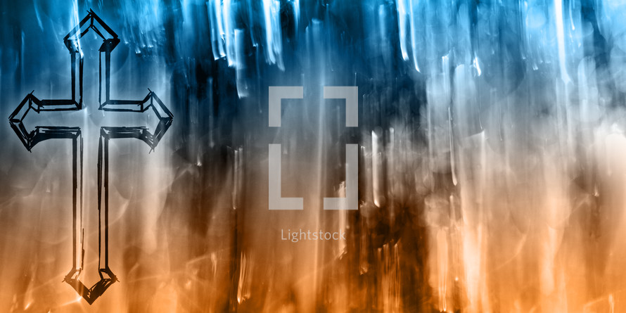 cross with dramatic blue to orange abstract blur background