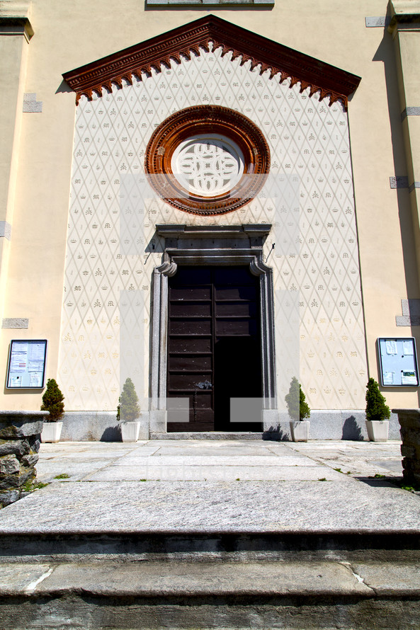 entrance to an old church in Italy in the Crugnola 