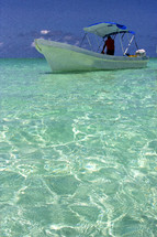boat on turquoise waters 