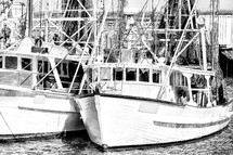 shrimp boats at a pier 