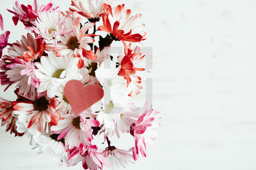 bouquet of flowers and red heart 