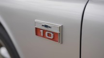 Classic Silver Chevrolet C10 Pickup Truck emblem.