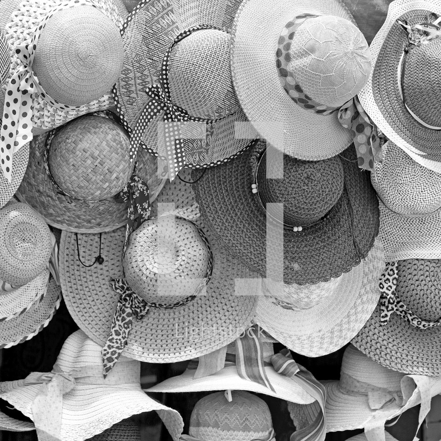 straw hats at a market 