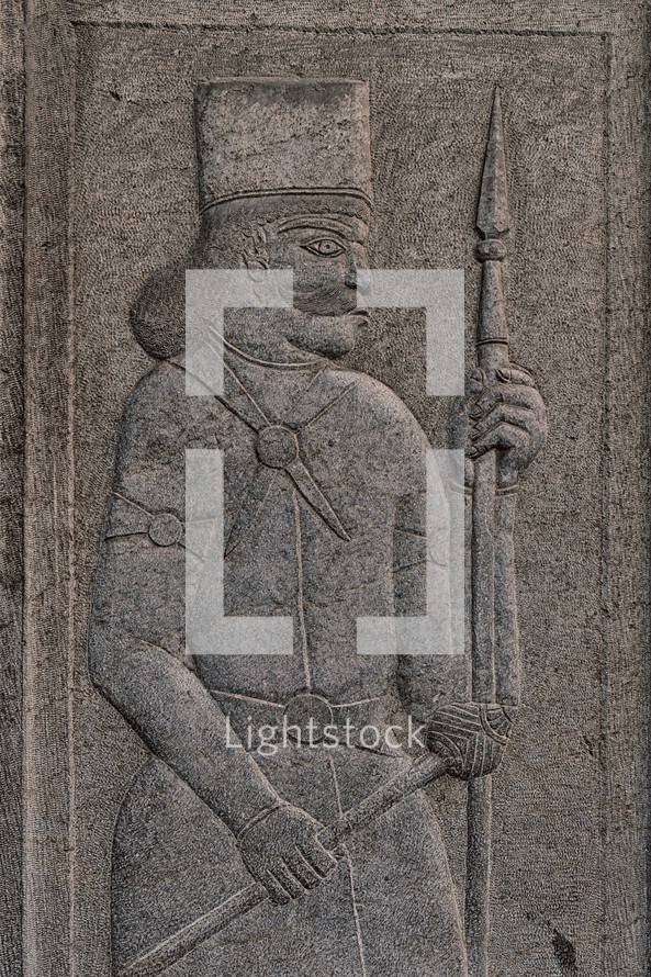 carving of an antique warrior 