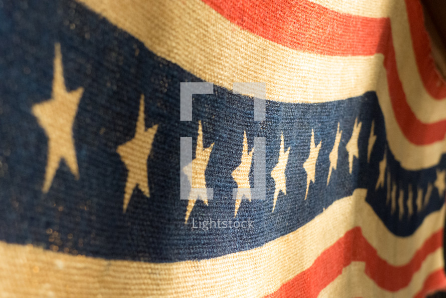 vintage stars and stripes banner viewed on an angle with partial focus