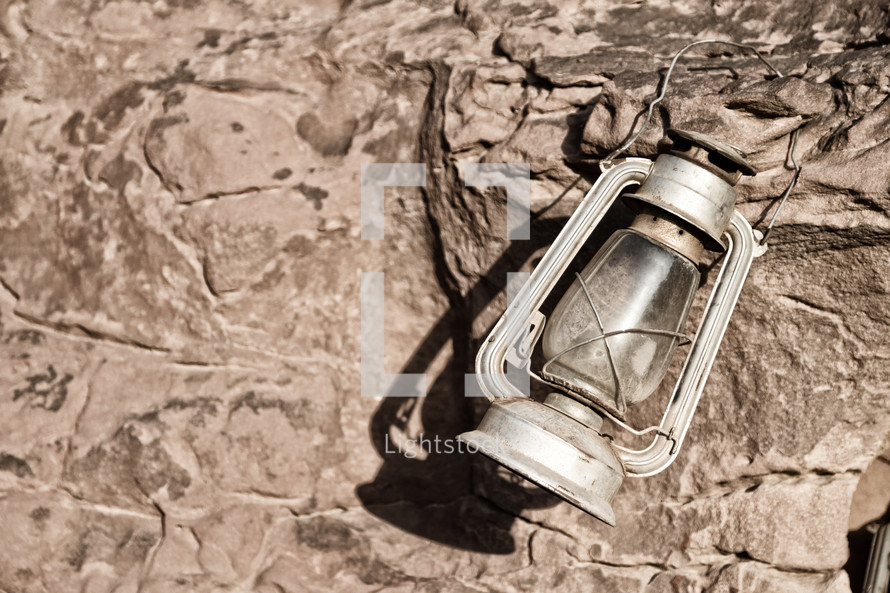 old lantern on rock 