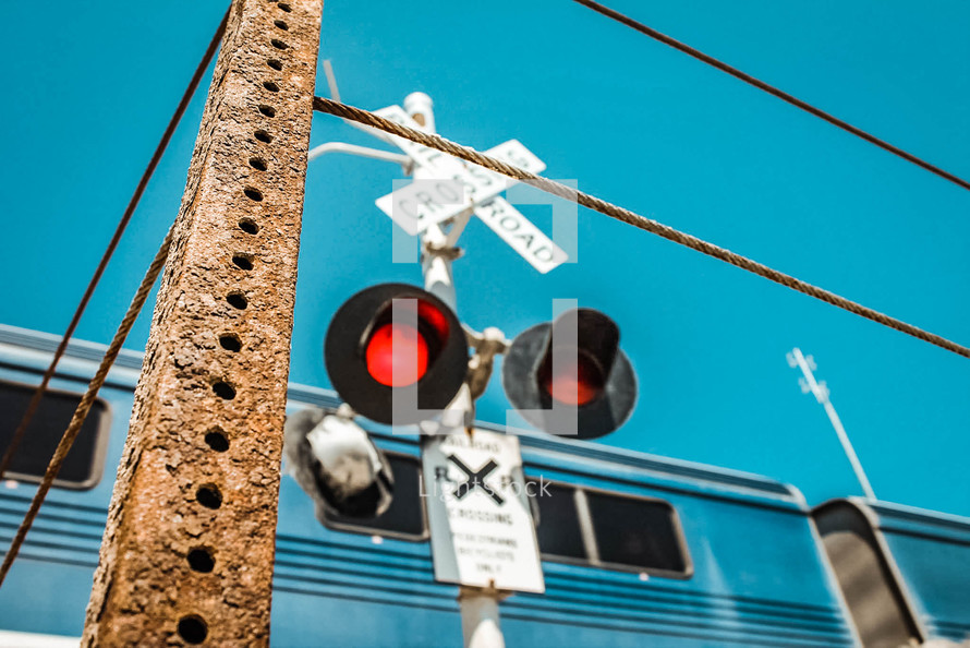 Railroad crossing with train crossing 
