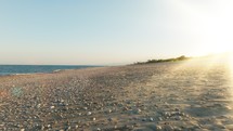 Sandy beach at sunlight 