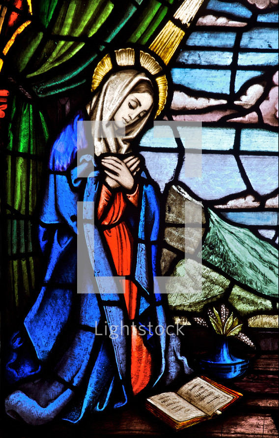 stained glass window of Mary at the annunciation of our Lord