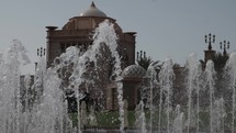Water fountain in slow motion in front of the Abu Dhabi palace in capital of United Arab Emirates. 