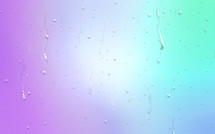 Water drops on purple, blue, turquoise and green background
