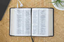 open Bible on a wicker table