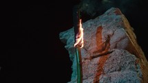 torch hanging on the wall in the night 