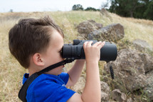 boy child with binoculars 