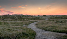 path on hills at sunset 
