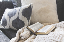 Bible on a couch 