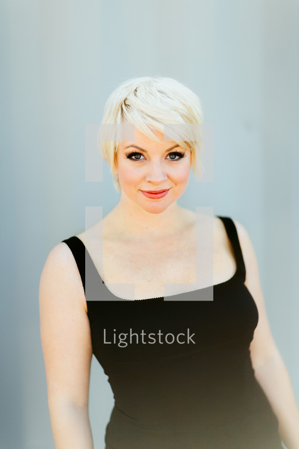 portrait of a blonde woman with short hair 