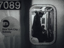 man on a subway train 