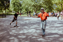 man roller blading in a park 
