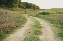 a dirt road in the country