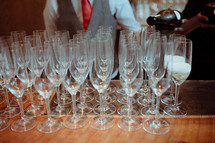 wine glasses at a wedding reception bar 
