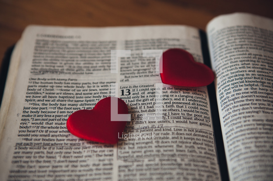 Candy hearts on the pages of a Bible
