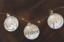 peace, noel, and joy Christmas ornaments