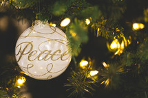 Peace ornament on a Christmas tree 