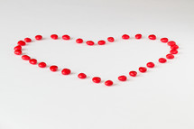 red hot heart candies in the shape of a heart