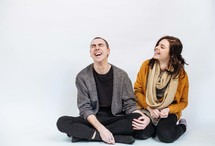 man and a woman laughing 