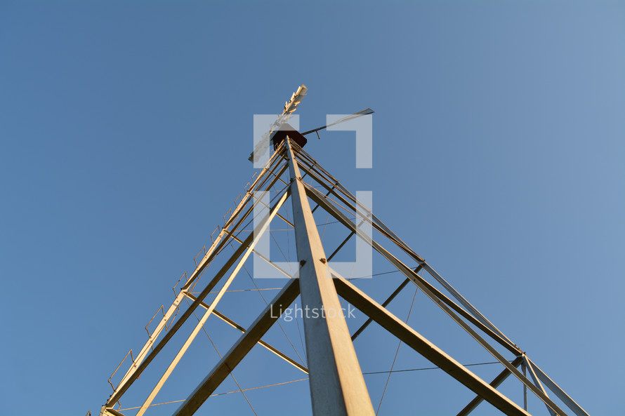 looking up to the top of a cell tower 